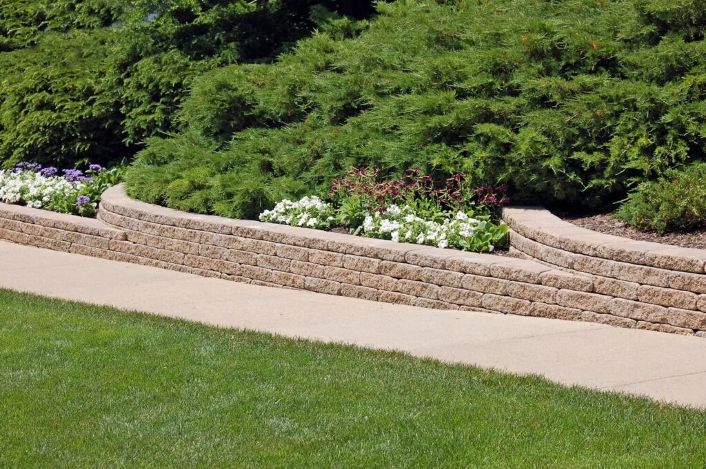 Build a Retaining Wall to Make Your Sloped Backyard Beautiful and More Useful